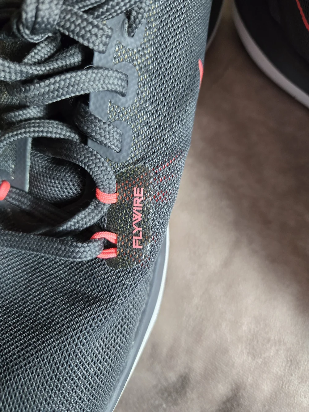 Nike Gray Running Shoes with Pink Swoosh